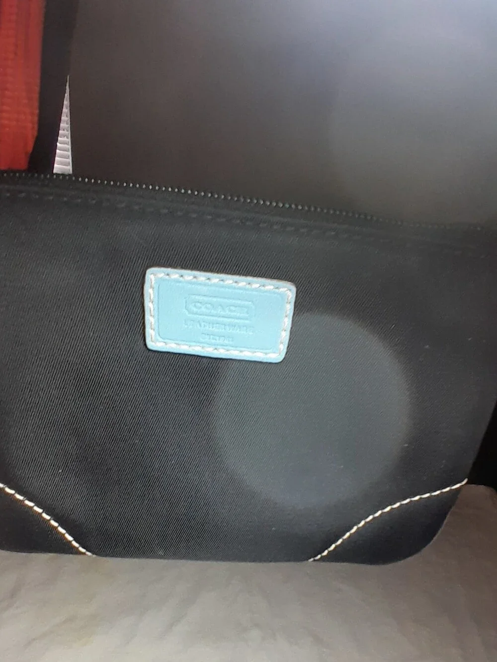 Black Wristlet Clutch with Light Blue Accents